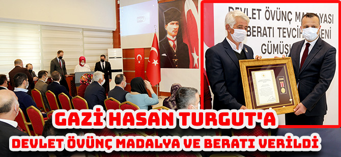 GAZİ HASAN TURGUT'A DEVLET ÖVÜNÇ MADALYA VE BERATI VERİLDİ